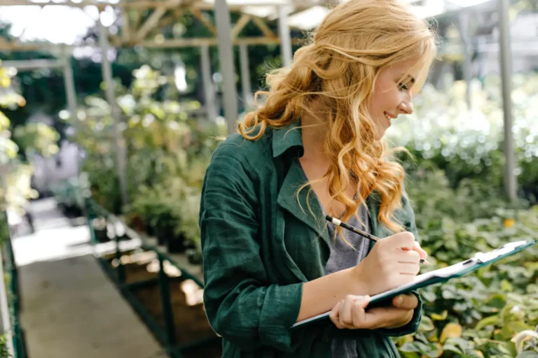 Woman in a greenhouse
